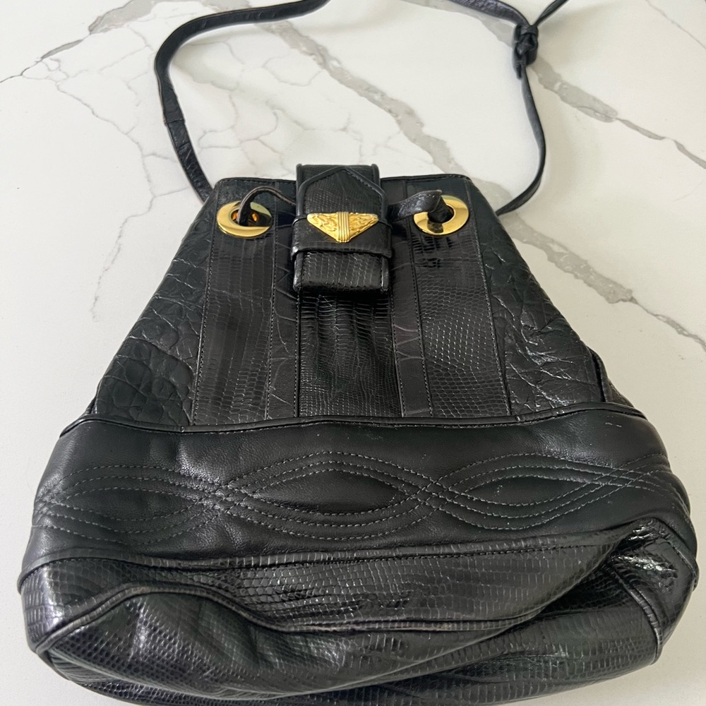 Sharif hand bag. Beautiful black leather with gold detail. Never used